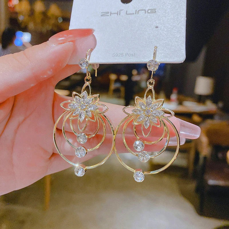 BOUCLES D'OREILLES TROIS CRÉOLES LOTUS EN CRISTAL