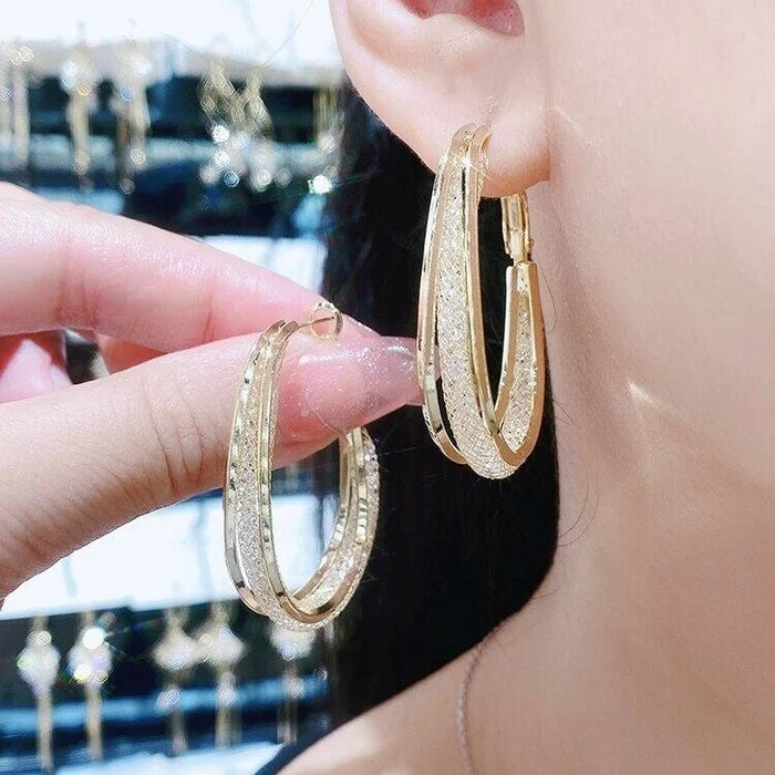 Boucle d'oreille Camelia