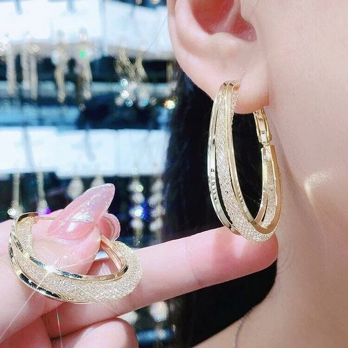 Boucle d'oreille Camelia