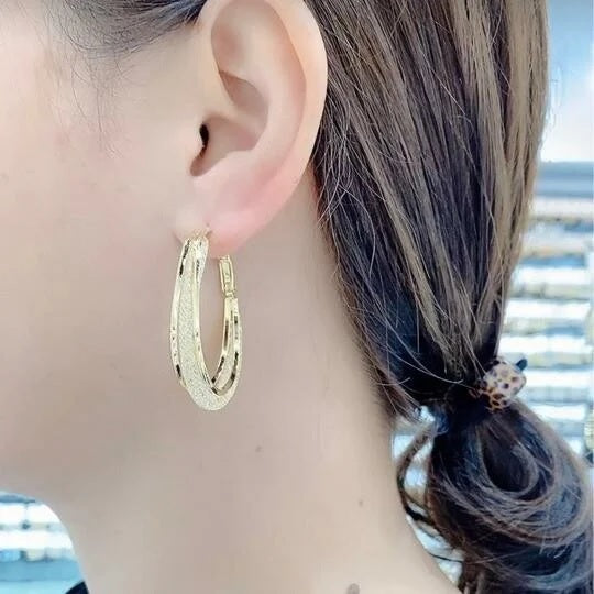 Boucle d'oreille Camelia
