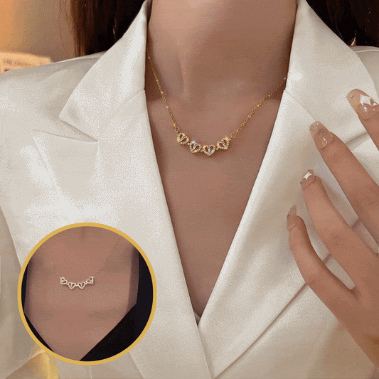 Collier en forme de cœur à quatre feuilles